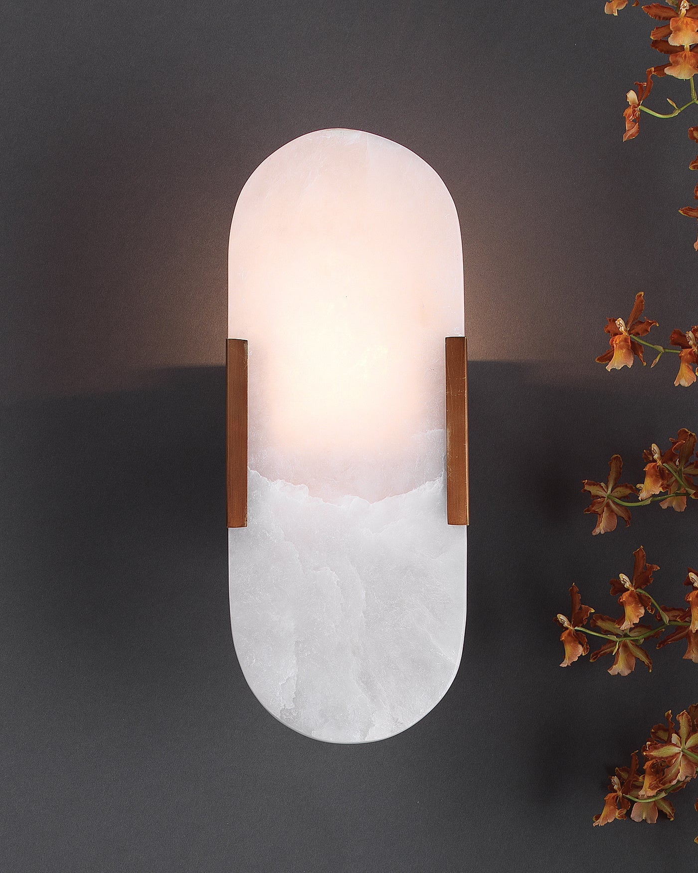 Delphi Wall Sconce in Antique Brass Metal