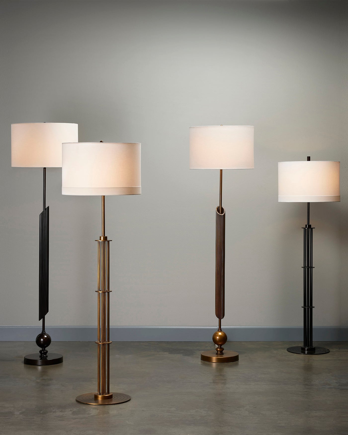 Marcus Floor Lamp in Antique Brass Metal With a Drum Shade in White Linen